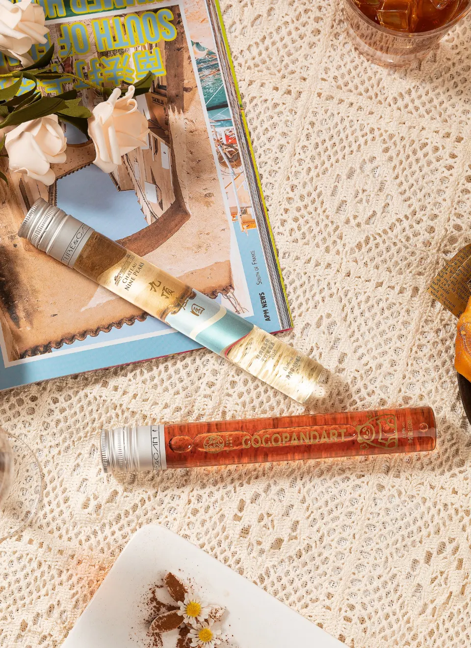 Two actual decorated wine tube bottles